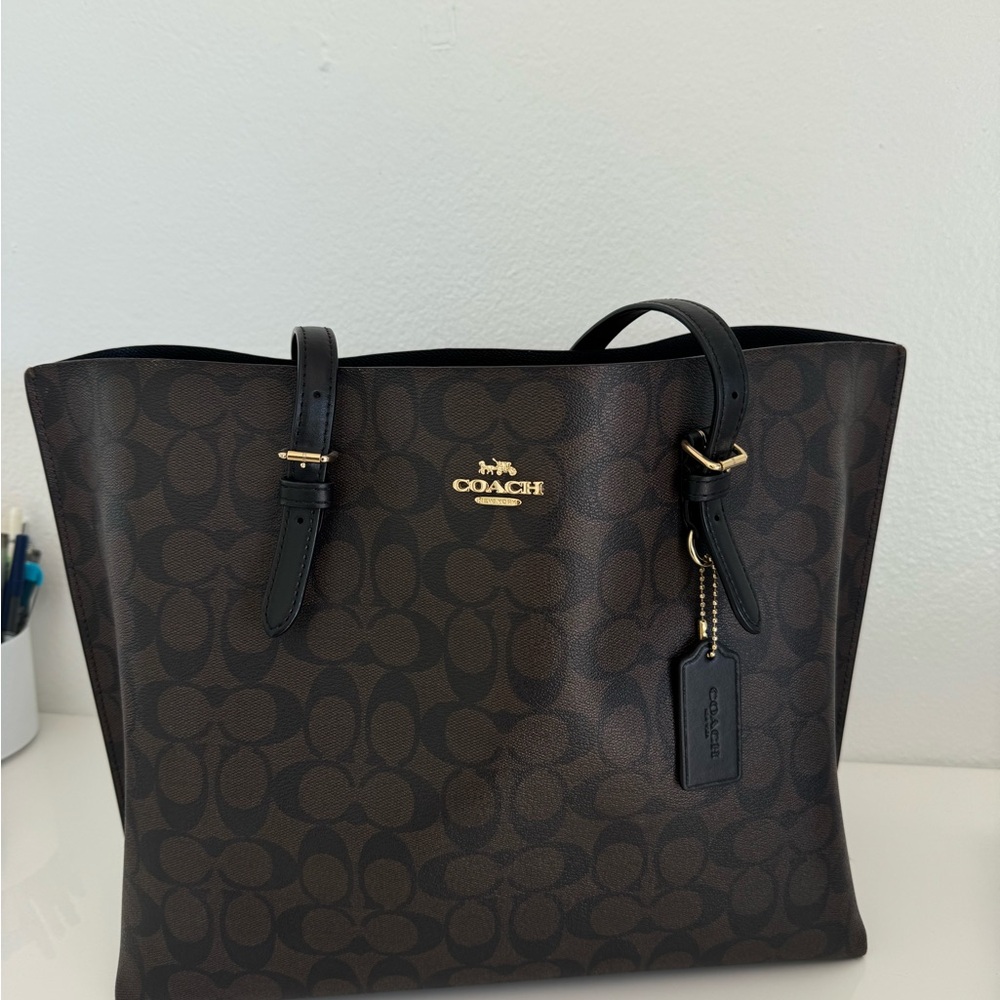 Coach Brown and Black Tote Bag, with red interior.